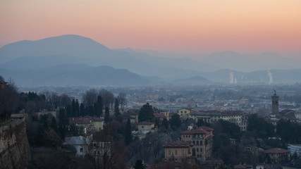 Bergamo, Italy. Landscape to the new city (downtown) at the sunrise from the old town located on the top of the hill