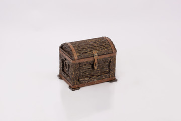 Wooden chest for household items and clothes on white background.