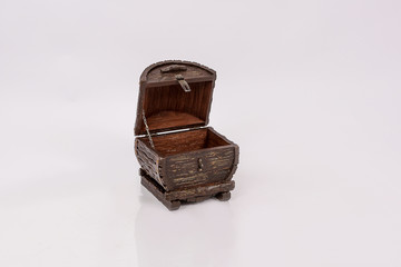 Wooden chest for household items and clothes on white background.