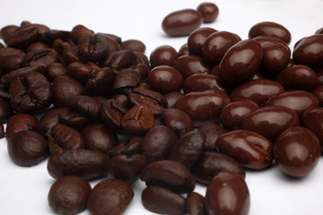 Chocolate and coffee on white background