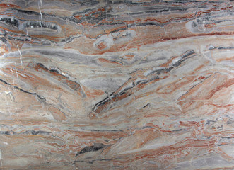 Natural stone marble pink with white, gray and red stains, called Arabescato Gold