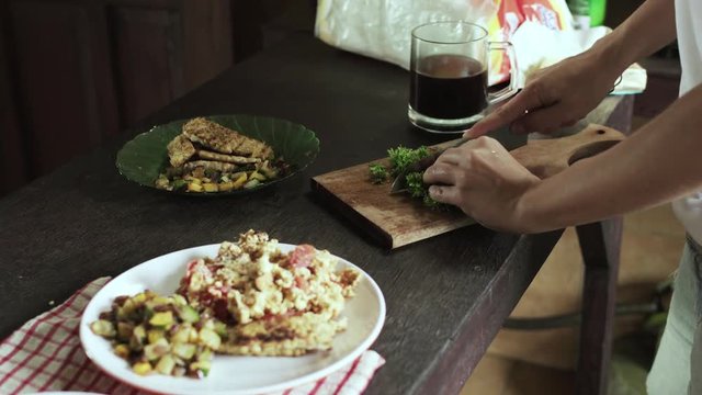 Girl choping a salad