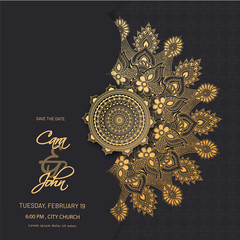 Decorative mandala pattern on black background for wedding party invitation card design.