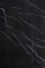 The texture of natural stone is black marble with patterns and white stripes, the stone is called Nero Marquina - 247721897