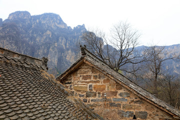 Fototapeta na wymiar ancient building ridge lies in GuoLiang, China