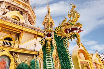 Fototapeta premium Thai dragon or Snake god Nagas statue at Tiger cave temple (Wat Thum Sua) before the new Chedi, Tiger Cave Temple, Wat Tham Sua, Krabi, Thailand, Asia