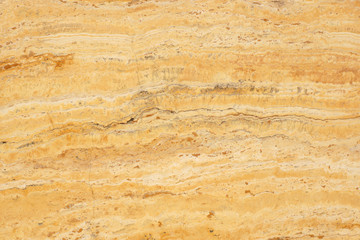 Plakat Natural stone travertine yellow color with an interesting pattern, called Travertino Giallo