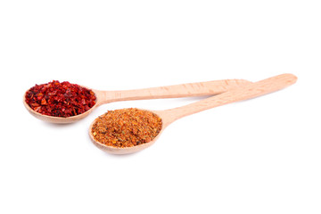 Spices mix on wooden spoons isolayed on a white background. Top view
