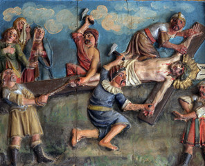 Crucifixion: Jesus is nailed to the cross