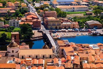 Sardinia, Italy - Panoramic view of the town of Bosa by the Temo river and surrounding hills seen...