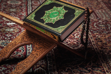 The holy book of the Koran on the stand