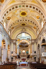 Fototapeta na wymiar Bosa, Sardinia, Italy - Interior of the Bosa Cathedral - Duomo di Bosa - at the Piazza Duomo square by the Temo river embankment
