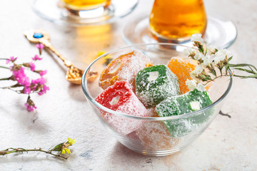 various pieces of turkish delight lokum and black tea