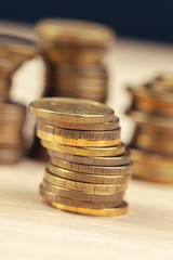 piles of coins on working table