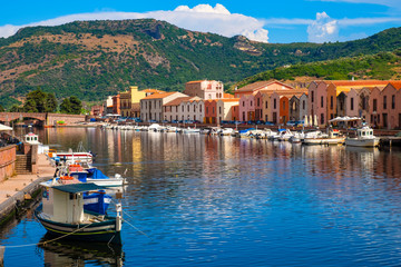 Bosa, Sardinia, Italy - Panoramic view of the old town quarter of Bosa by the Temo river embankment...