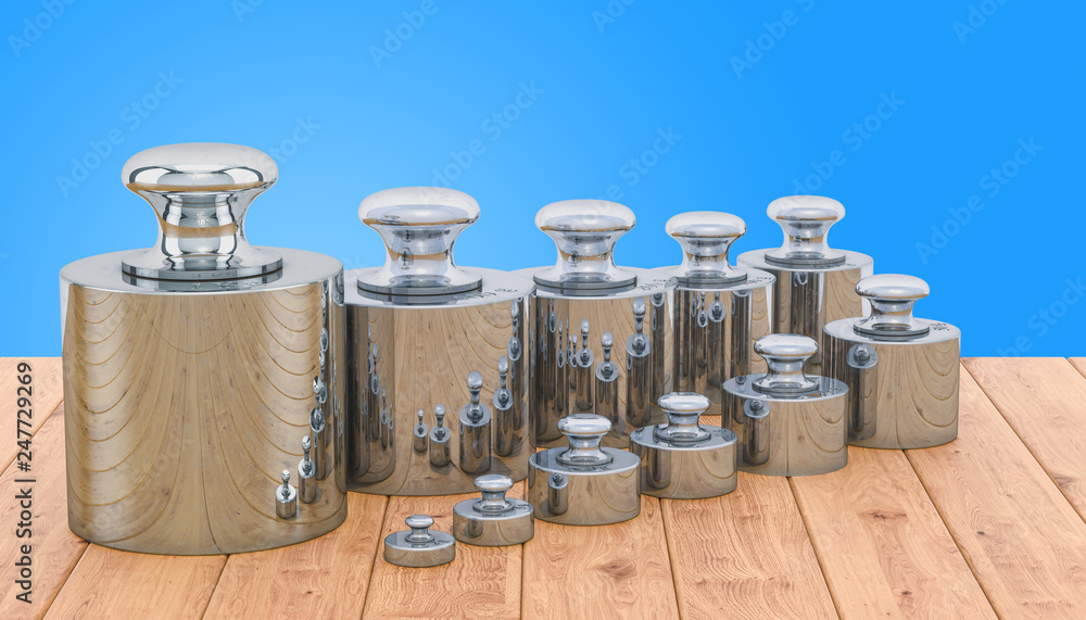 Aufkleber weights scale calibration set on the wooden table, 3d rendering