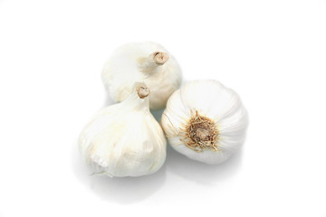 Obraz na płótnie Canvas Pile of garlic bulbs on white background.