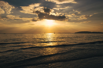 Landscape tropical sunset on the beach. Ao Nang, Krabi province, Thailand