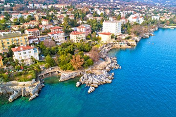 Town of Lovran and Lungomare sea walkway aerial panoramic view