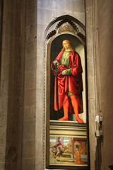 Painting San Giuliano by Francesco Botticini and Jacopo del Sellaio in Orsanmichele Church. Florence, Italy.