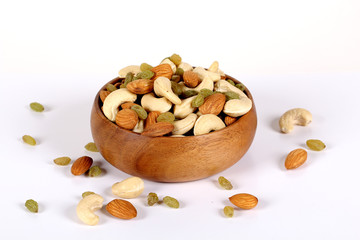 ssorted nuts on white, dry fruits, mix nuts, almond, cashew,  raisin