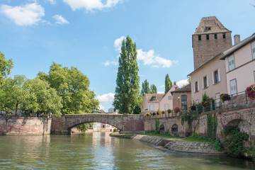 Fototapeta na wymiar Old buildings along the canal in Strasbourg France.
