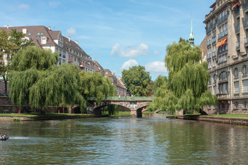 Fototapeta na wymiar Old buildings along the canal in Strasbourg France.