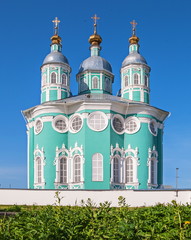 Tower-loophole with a weather vane on the roof of an ancient fortress