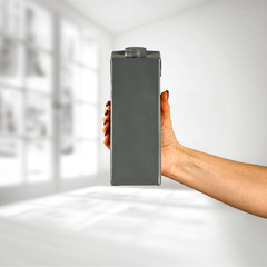 Juice product in woman hands. Free space for your decoration.