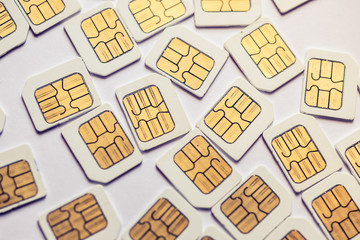 Many Micro SIM 3G for mobile over on white background.