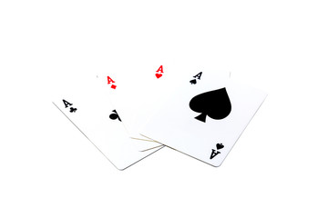 A winning poker hand of four aces playing cards suits on white.