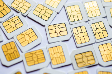 Many Micro SIM 3G for mobile over on white background.