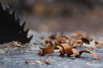 Sawdust on a woodworking machine.