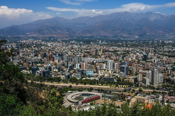 Aerial view of a city and The Andes mountain in the background, Santiago, Chile