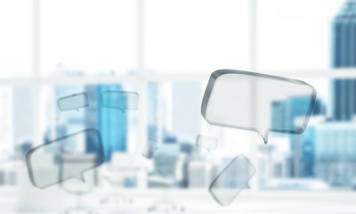 Concept of communication by glass empty chat icon on office background. Mixed media