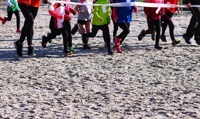 Children running on sand