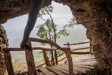 Mountain landscape. Rainy weather. Ancient staircase