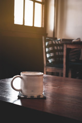 coffee cup on wooden table