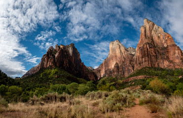 the cliff face of zion national park on a clear crisp blue autumn day