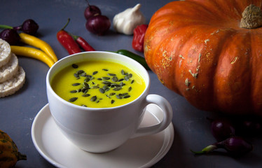 Pumpkin asian coconat cream soup. Autumn hot food
