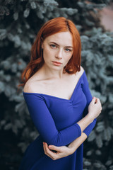 Portrait of gorgeous natural luxury glamour sexy lady outdoors in blue dress