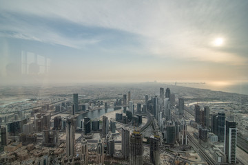 DUBAI, UAE - October, 2018: Top view of Dubai urban skyline from Burj Khalifa. Dubai city view from the top of Burj Khalifa