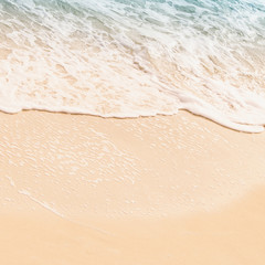 Fototapeta na wymiar Sea wave on sand background