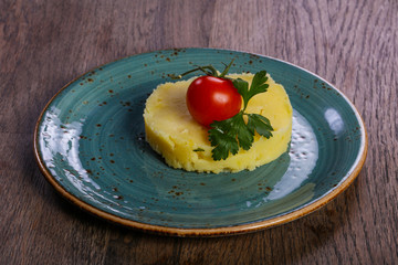 Mashed potato served tomato