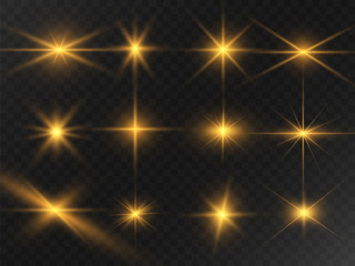 : Set of gold bright beautiful stars. Light effect Bright Star. Beautiful light for illustration. Christmas star. White sparks sparkle with a special light. Vector sparkles on transparent background
