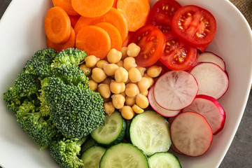 Fresh ingredients for vegetable salad, closeup. Diet food