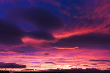 Fototapeta na wymiar Sunrise vista from Pentraeth overlooking the Snowdonia Mountain Range