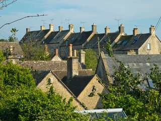 Higgledy-piggledy rooftops in quaint Bisley village, The Cotswolds, Gloucestershire, UK