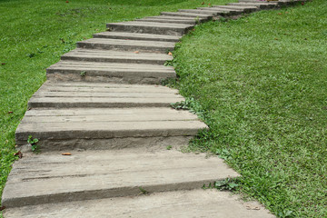 garden path walkway on green grass turf