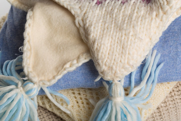 Winter and fall cozy sweaters stack, woolen sweaters